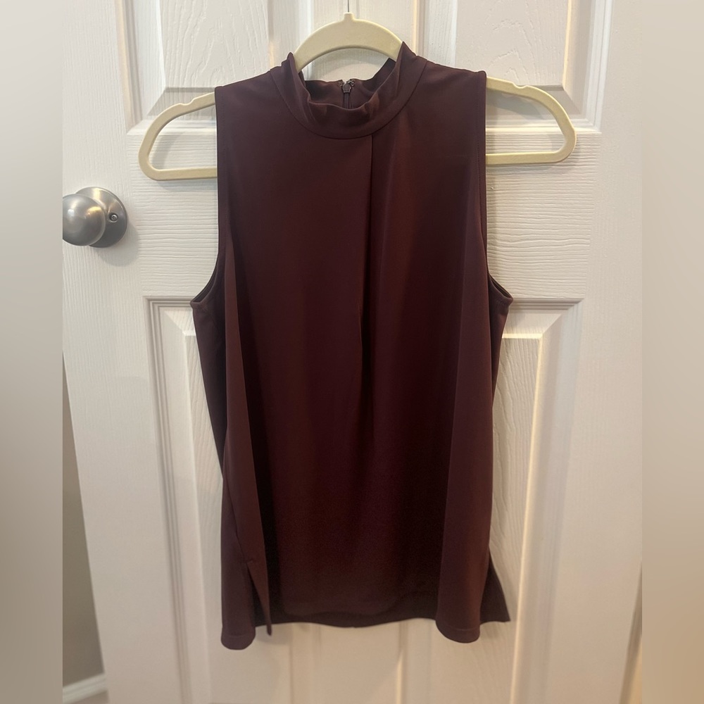Ann Taylor high neck polyester top. Has only been worn once!